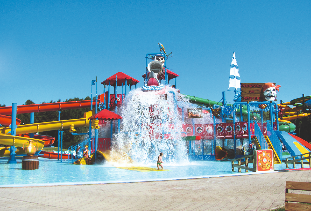 An image of the waterpark at Jaz Makadi Saraya with water flowing from the top of the slide.