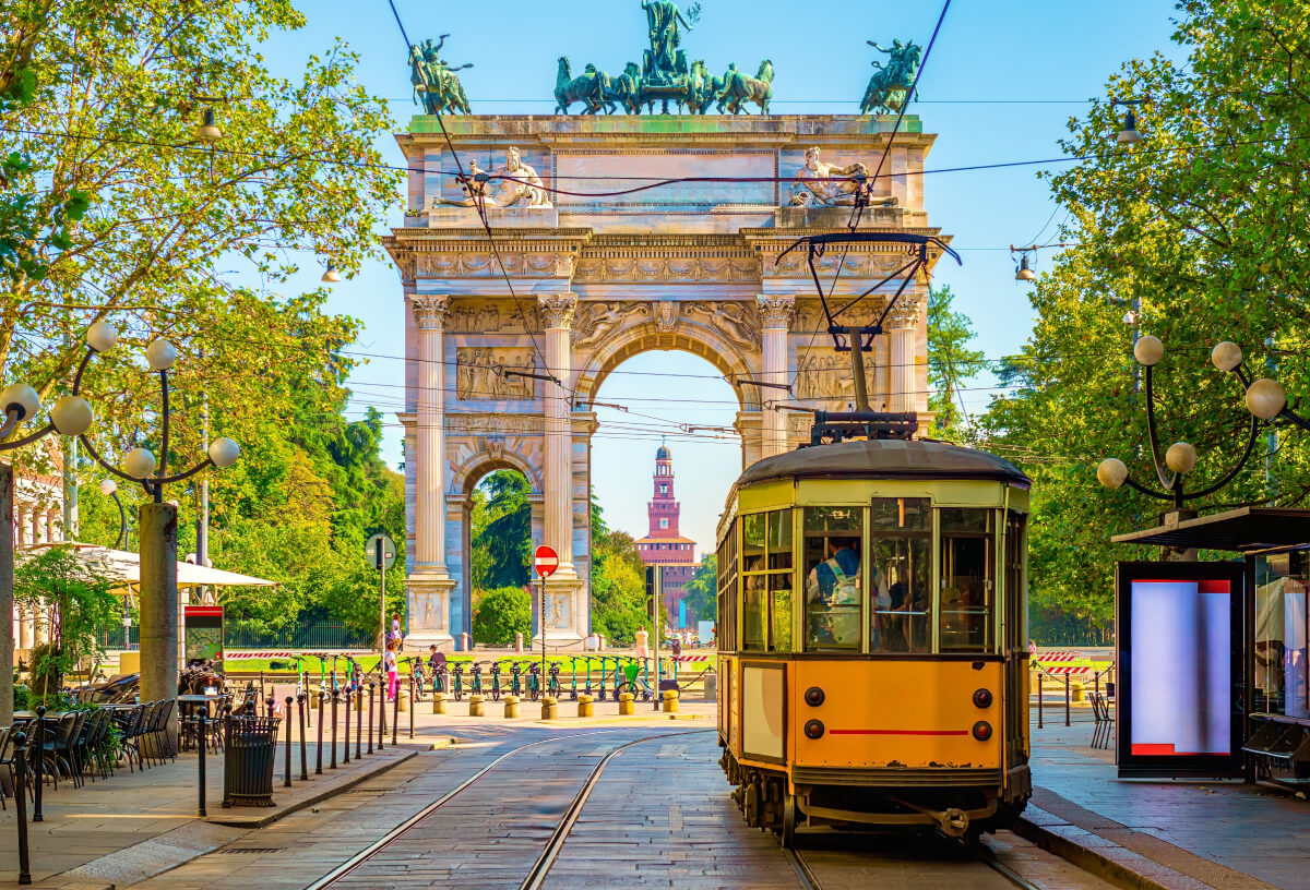 Cabl car and archway in Milan