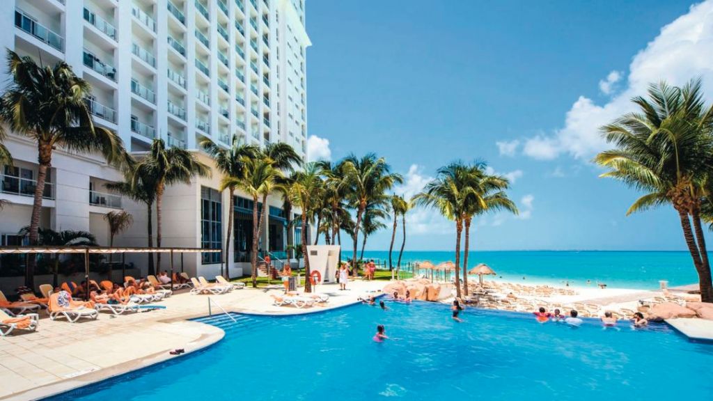 Pool area looking out onto the beach at the RIU Cancun Hotel