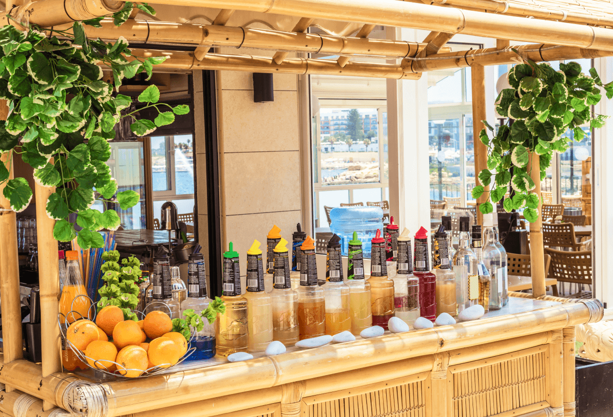 Beach bar in Malta with a variety of colourful drinks on display