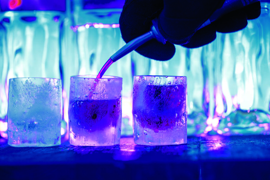 Pouring shots in an ice bar in Lapland
