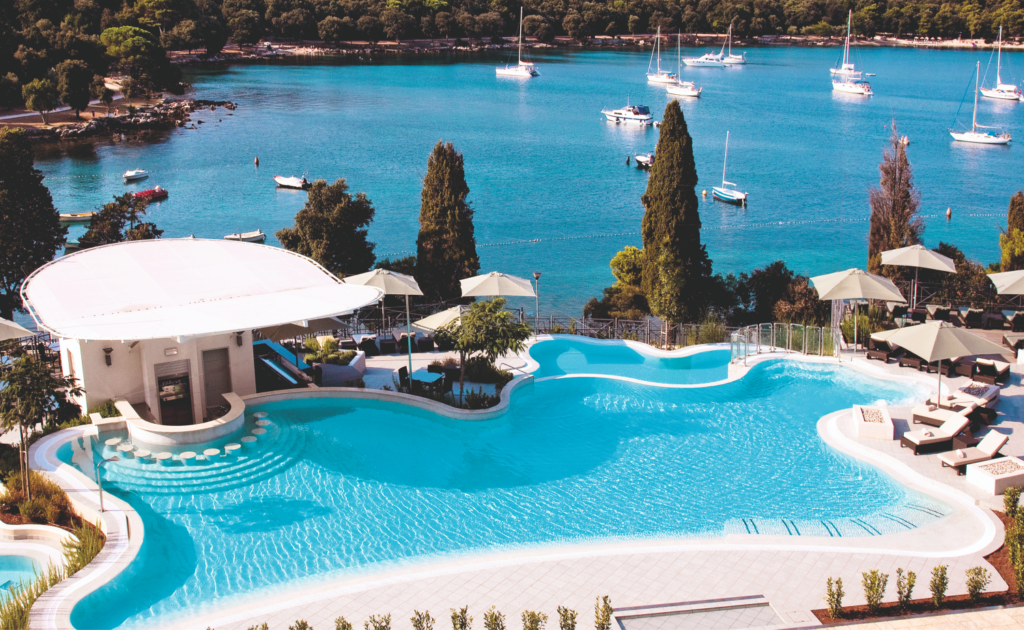Outdoor pool and swim up bar with ocean views at the Monte Mulini in Croatia