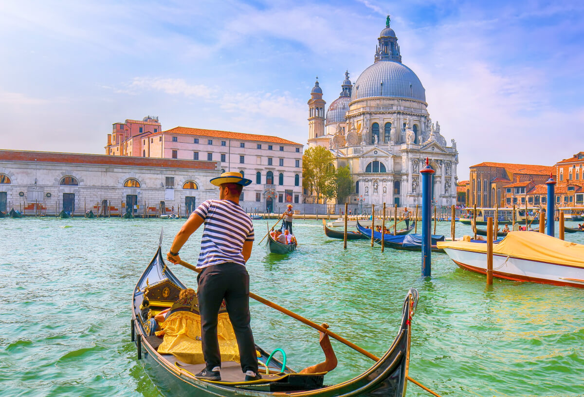 Gondola boat trip along the river in Venice